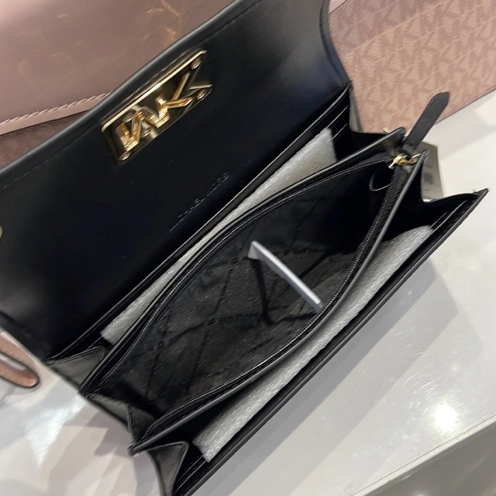 Michael Kors Mimi Large Saffiano Leather Bi-Fold Continental Wallet
Black 
NWT - Picture 10 of 16